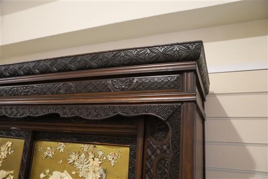 A Japanese Meiji period carved wood and shibayama cabinet, W.4ft 10in. D.1ft 4in. H.7ft 11in.